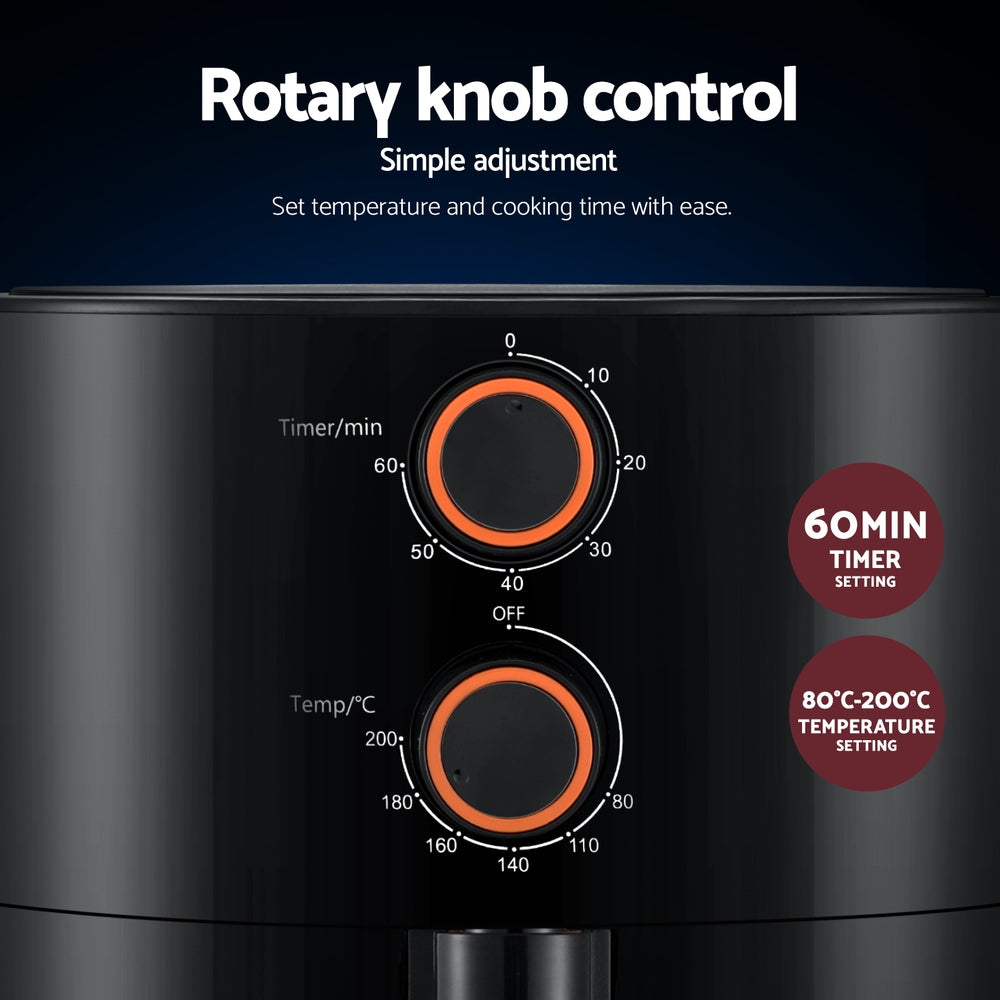 Black appliance with rotary knobs for temperature and time control on a dark background