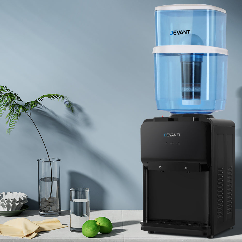 Devanti water cooler with blue water tank on a light gray surface against a light blue wall.